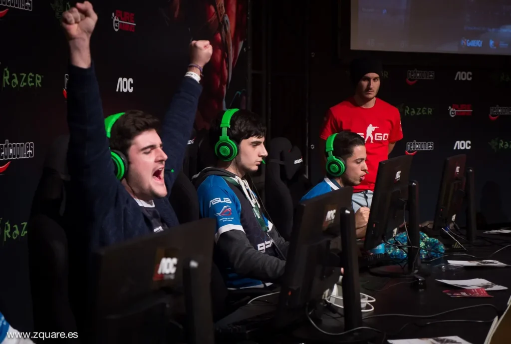 eSports gamers sitting behind their computers.