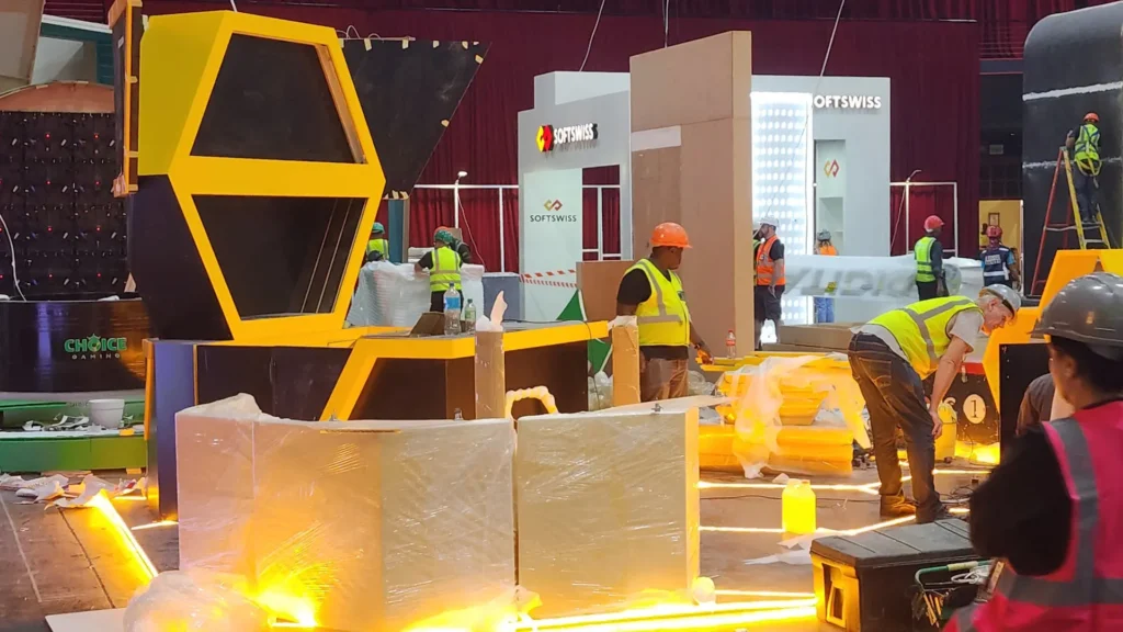 Booth Exhibits™ constructors assembling Melbet's exhibition stand in 2026.