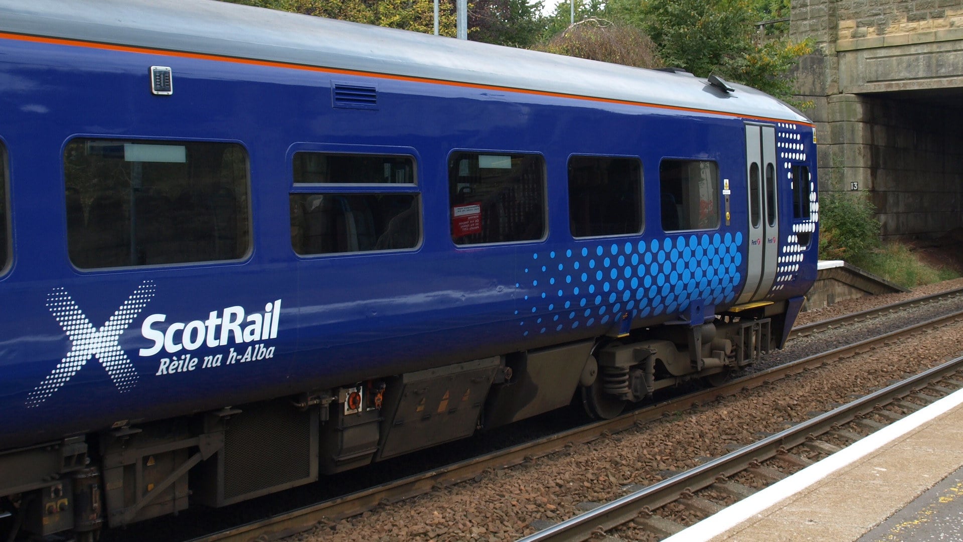 ScotRail train heading into a tunnel.