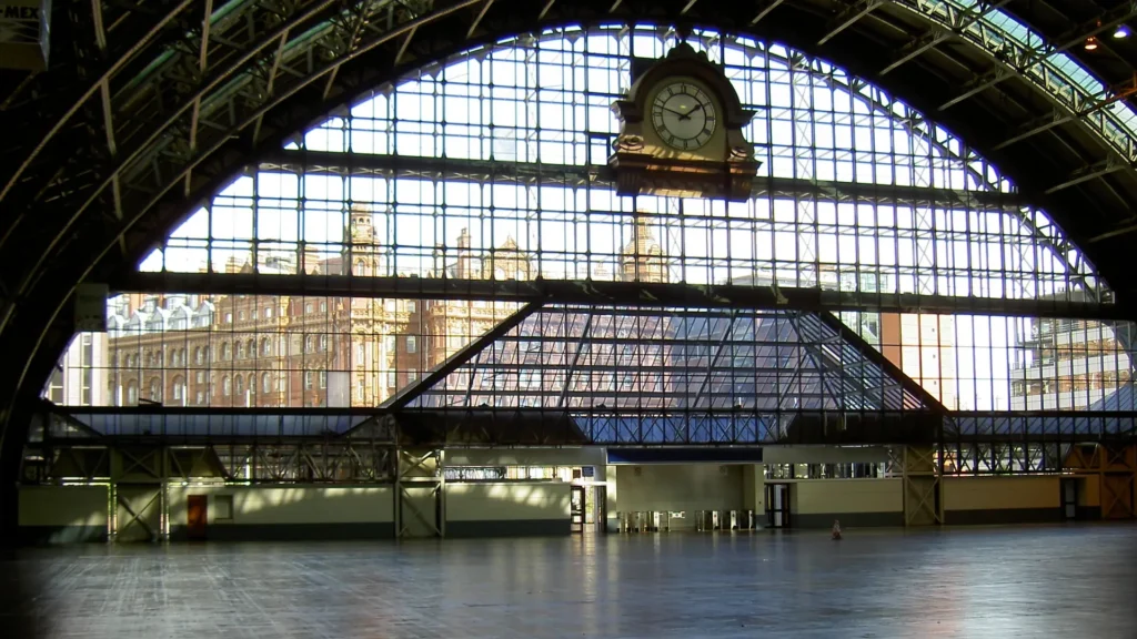 Interior view of the glass windows of Manchester Central's main hall.