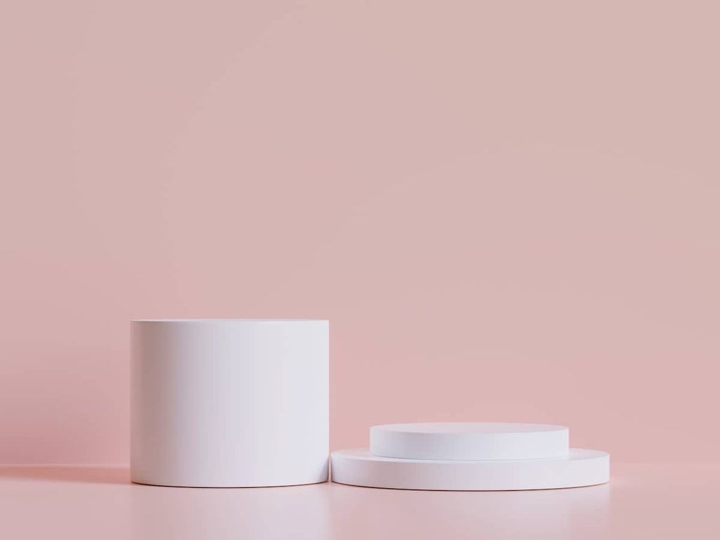 A cylinder and a base on a pink background.