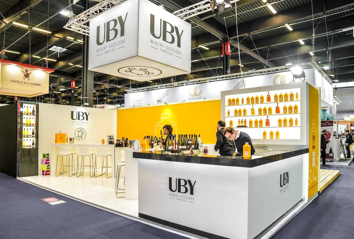 A hired modular exhibition stand with a rigged banner.